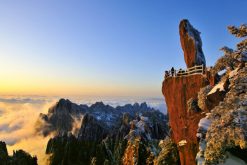 Hiker exploring Xihai Sceanic Area on a Mount Huangshan tour