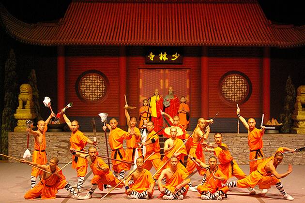 travelers of China tour enjoy Chinese Kung Fu show at the Red Theater