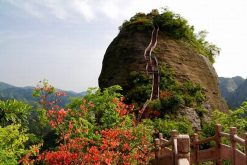 travelers visit Bajiaozhai National Park in China adventure tour